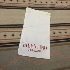 Valentino Garavani white drawstring Dustbag 
15” x 8” Red lettering Garment bag